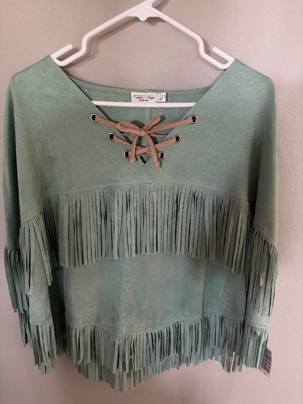 Tasha Polizzi vest
